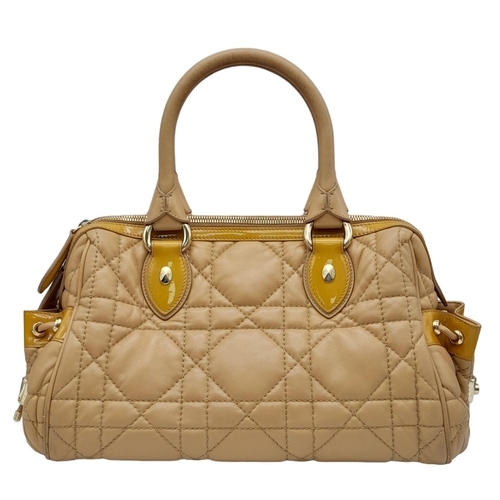 108 - Christian Dior Cannage, Quilted Side Pocket Satchel.
Extremely soft and luscious to the touch, this ... 