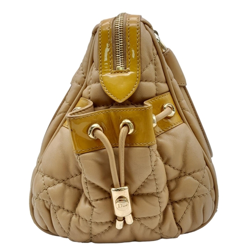 108 - Christian Dior Cannage, Quilted Side Pocket Satchel.
Extremely soft and luscious to the touch, this ... 