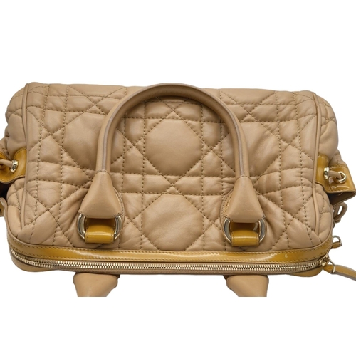 108 - Christian Dior Cannage, Quilted Side Pocket Satchel.
Extremely soft and luscious to the touch, this ... 