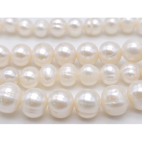 1177 - A Two-Strand Cultured Pearl Necklace with a CC Clasp. 84cm length.