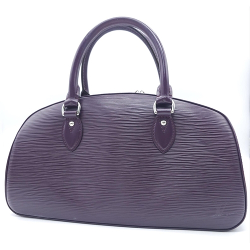 129 - A Louis Vuitton Burgundy Jasmin Cassis Handbag. Epi leather exterior with two rolled leather handles... 