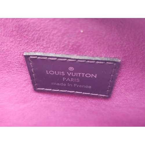 129 - A Louis Vuitton Burgundy Jasmin Cassis Handbag. Epi leather exterior with two rolled leather handles... 