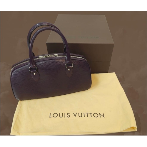 129 - A Louis Vuitton Burgundy Jasmin Cassis Handbag. Epi leather exterior with two rolled leather handles... 