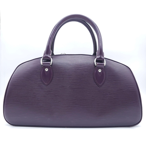 129 - A Louis Vuitton Burgundy Jasmin Cassis Handbag. Epi leather exterior with two rolled leather handles... 