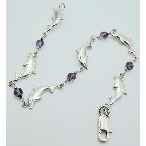 1412 - A fancy 925 silver Dolphin & Lilac stone link bracelet. Total weight 4.3G. Total length 17cm.