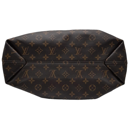 143 - Louis Vuitton Sully Bag.
Famed LV Monogrammed canvas exterior, thick tanned leather handle and gold ... 