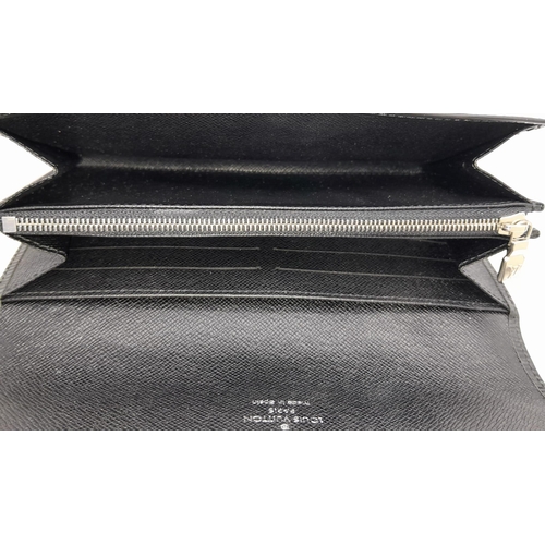 150 - Louis Vuitton Black Epi Leather Long Wallet.
Quality leather throughout, LV embossed logo on front, ... 