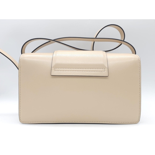 32 - A Givenchy Nude Infinity Crossbody Bag. Leather exterior with front flap, gold toned hardware, adjus... 