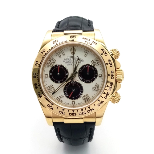 36 - A Rolex Daytona Chronograph Panda 18K Gold Gents Watch. Black leather strap with Rolex gold clasp. 1... 