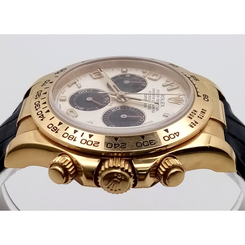 36 - A Rolex Daytona Chronograph Panda 18K Gold Gents Watch. Black leather strap with Rolex gold clasp. 1... 