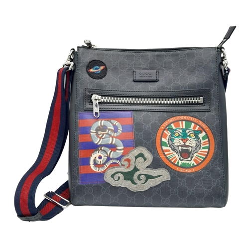 39 - Gucci Night Courier Crossbody Bag.
Classic GG canvas, patch detail, logo patch to the front, front z... 