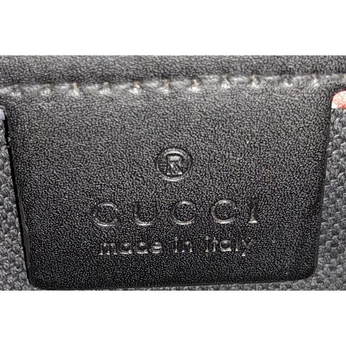 39 - Gucci Night Courier Crossbody Bag.
Classic GG canvas, patch detail, logo patch to the front, front z... 