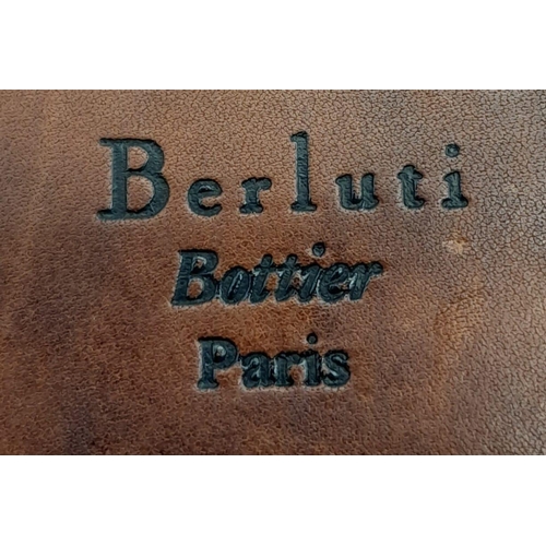 507 - Berluti Brown Leather Long Wallet.
Stitched throughout on quality leather, this unisex wallet opens ... 