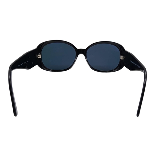 556 - Black Chanel Sunglasses with Floral Motifs. 
Built to be worn whilst driving a small convertible car... 