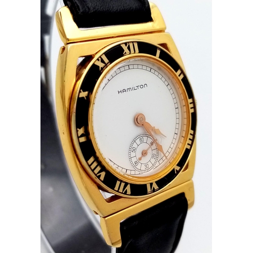 557 - A Men’s 1980’s Hamilton Piping Rock, 18 Carat Gold Electroplated, Second
Dial Quartz Watch Being the... 