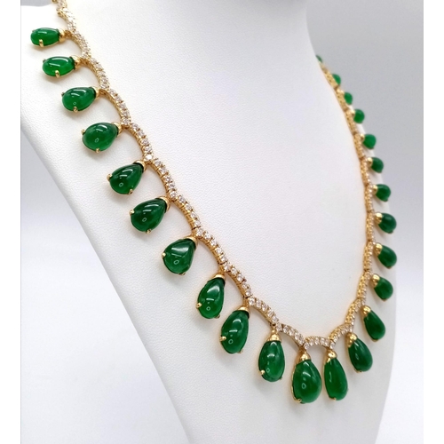 564 - An 18K Gold Emerald and Diamond Necklace. 44ctw of natural emerald hanging teardrops with over 150 r... 