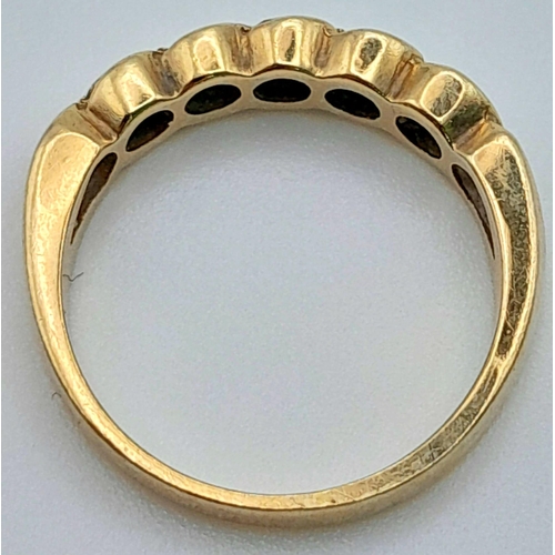 572 - 9K YELLOW GOLD, DIAMOND 5 STONE RING.
0.25CTW, WEIGHS 2.4G AND SIZE K.

REF: SC 7073