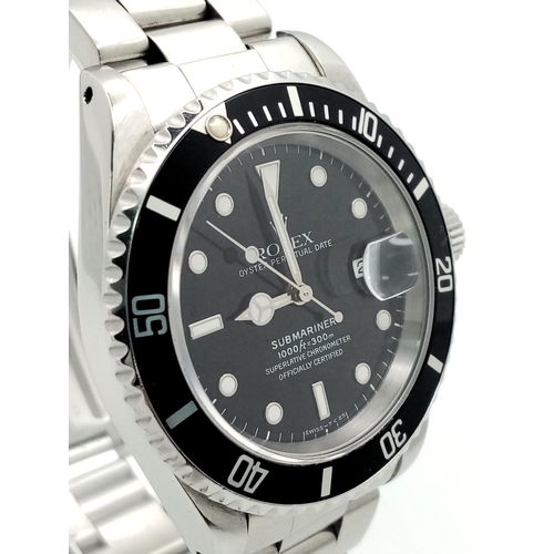 8 - A Rolex Oyster Submariner Gents Watch. Stainless steel bracelet and case - 40cm. Black dial with dat... 