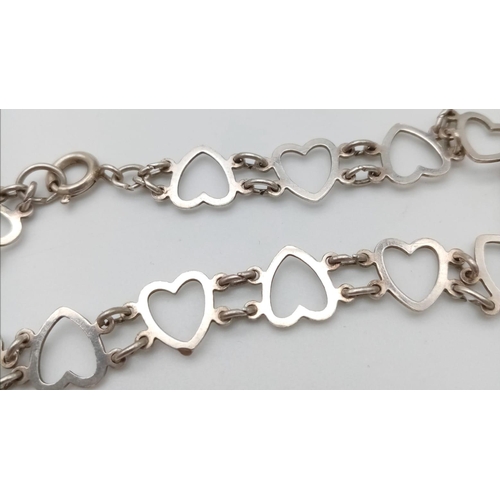 1056 - 2X sterling silver bracelets: one with heart linked, the other one come with a heart padlock. Total ... 