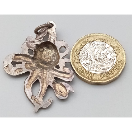 1104 - A SILVER OCTOPUS PENDANT. Approximately 4.7cm length (including bail), 9.7g weight.    Ref: SC 7014