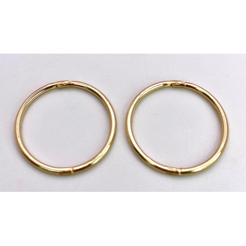 1181 - A PAIR OF 9K YELLOW GOLD SLEEPER HOOP EARRINGS. 1.5cm diameter, 0.8g total weight.