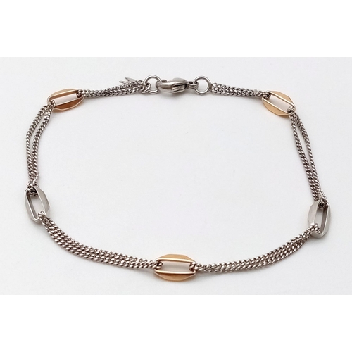 186 - A PLATINUM & 18K ROSE GOLD BRACELET. 17cm length, 4.5g total weight.