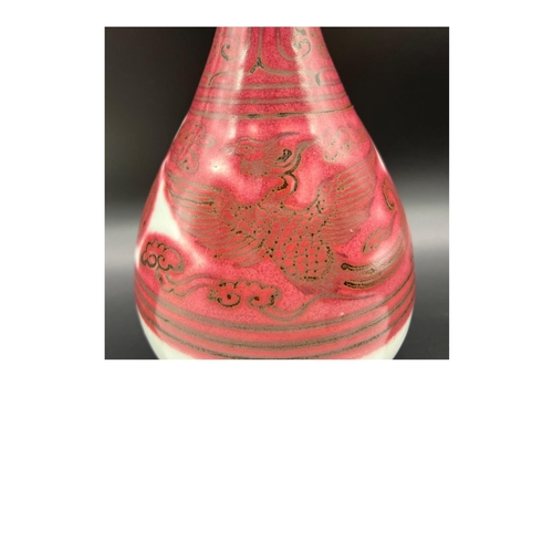 333 - A red under-glazed Yuhuchun vase, Yuan dynasty. In 1955, a red under-glazed flower pattern jar with ... 