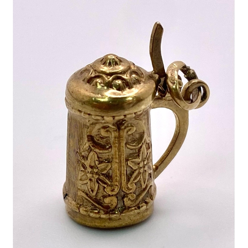 544 - 9K YELLOW GOLD, TANKARD CHARM WHICH OPENS.
WEIGHS 2.3G AND MEASURES 1.5CM LONG.

REF: SC 7070