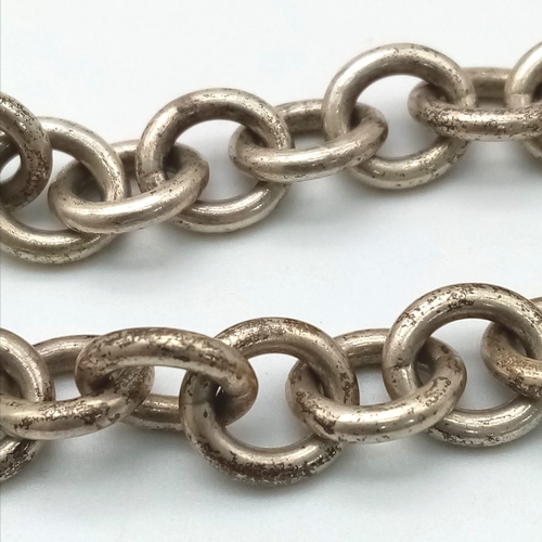 620 - A STERLING SILVER TIFFANY & CO STYLE BRACELET. 20cm length, 36g total weight.