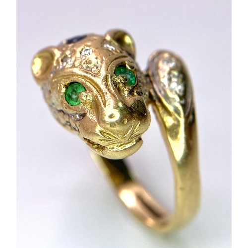 642 - A 9K GOLD DIAMOND , SAPPHIRE AND EMERALD SET PANTHER RING .   4.8gms   size J