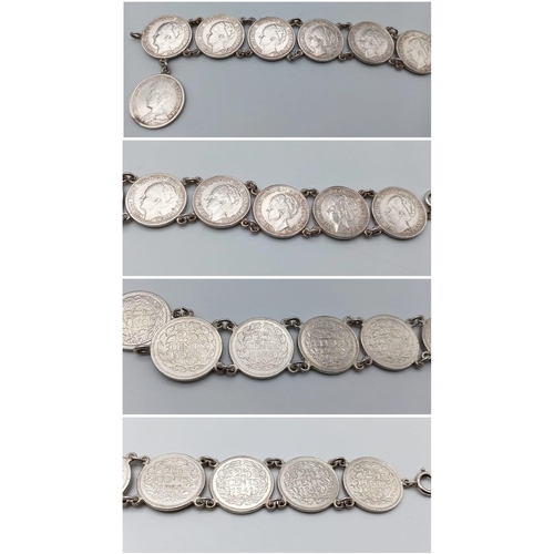 701 - A SILVER COIN BRACELET SET WITH 9 x 25 CENTS COINS. DATE RANGES 1917 - 1941. 18CM LENGTH, 35G TOTAL ... 