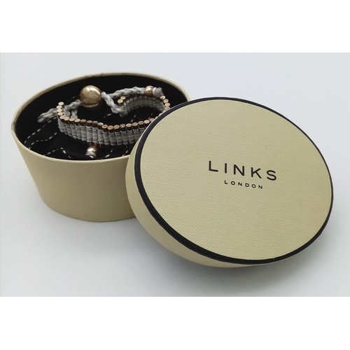 879 - A Links of London Silver & White ‘Friendship’ Bracelet in Original Box.