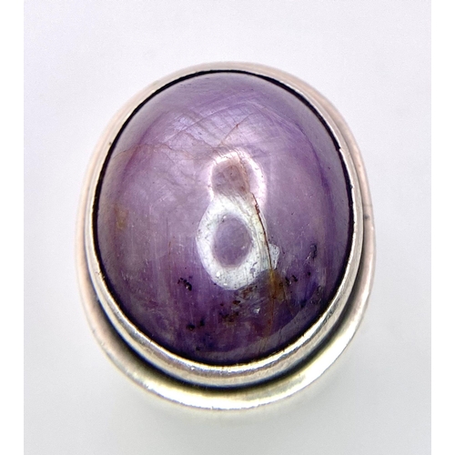 964 - A STERLING SILVER AMETHYST CABACHON STONE SET RING.  SIZE P, 23.5G TOTAL WEIGHT.    Ref: SC 7006