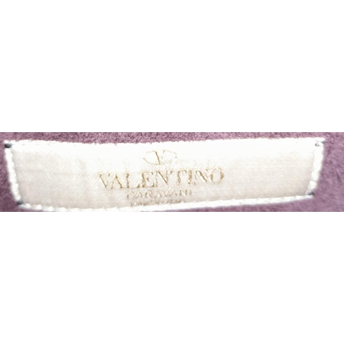 101 - A Valentino Garavani Tribal Rockstud Bag.
Quality textured leather, purple with tribal design with p... 