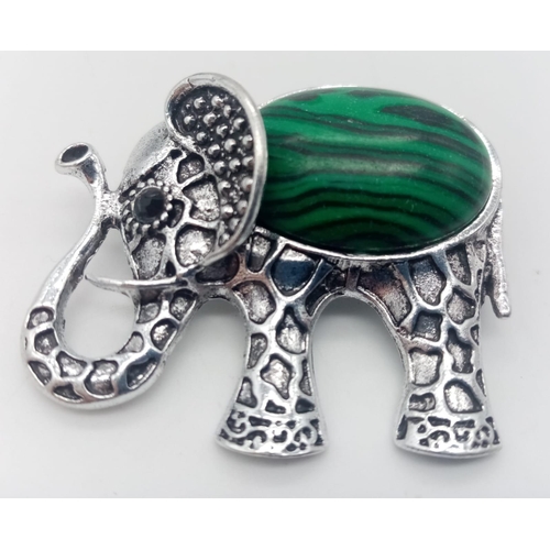 1095 - A Marcasite Elephant and Rose Gold Bee Brooch - Both on decorative white metal with blue stone eyes.... 