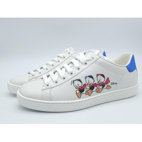 157 - Pair of Gucci Disney, HUEY DEWEY & LOUIE, Ace Sneakers.
Great pair of sneakers, size 35 Euro (UK 2/3... 