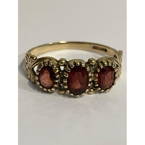 181 - Beautiful 9 carat GOLD and RED TOURMALINE RING. Having three tourmaline gemstones set to top in tril... 