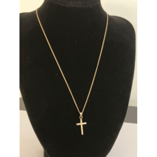 266 - 9 carat GOLD CROSS Mounted on a 9 carat GOLD CHAIN.  Gold cross = 2.5 cm. Gold chain = 46 cm.