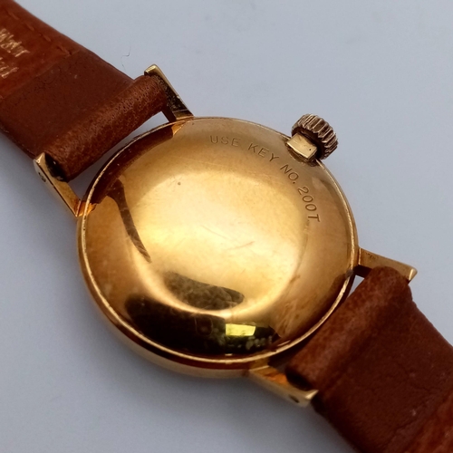 345 - A Lovely Vintage 18K Gold Cased Tissot Ladies Watch. Brown leather strap. 18k gold inner hallmarked ... 