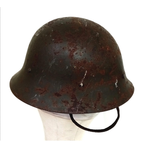 356 - WW2 Japanese Civil Defence (Home Guard) Helmet with liner.