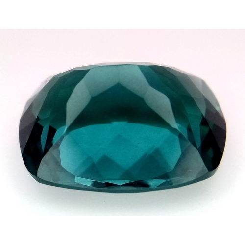 374 - A 14ct Rectangular Cut Apatite Gemstone. Well faceted with a trillion base. No visible marks or incl... 