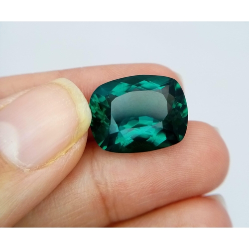 374 - A 14ct Rectangular Cut Apatite Gemstone. Well faceted with a trillion base. No visible marks or incl... 