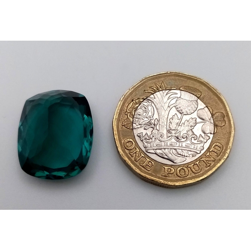 374 - A 14ct Rectangular Cut Apatite Gemstone. Well faceted with a trillion base. No visible marks or incl... 