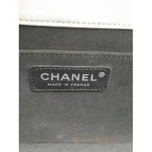 4 - Chanel Silver Leather Flap Bag.
Stunning quality throughout, this bag features a slip chain handle, ... 