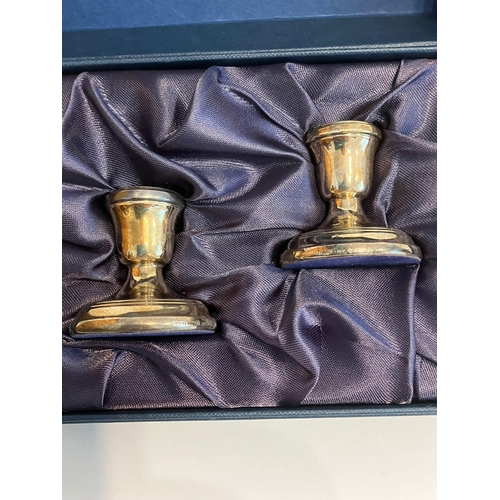 413 - Pair of SILVER CANDLESTICKS in gift box. Condition as new.