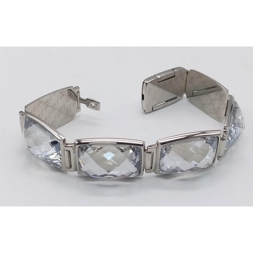 415 - A Stunning Swarovski Rhodium Plated ‘Nirvana-model 1166714’ Crystal
Bracelet. 19.5cm Length, 1.8cm W... 