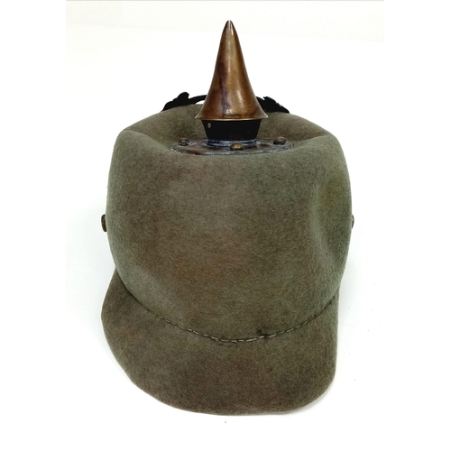 524 - WW1 Imperial German Army Prussian M15 Pickelhaube Uniform Helmet. A felt constructed example with ni... 