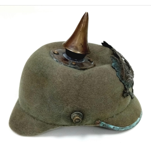 524 - WW1 Imperial German Army Prussian M15 Pickelhaube Uniform Helmet. A felt constructed example with ni... 