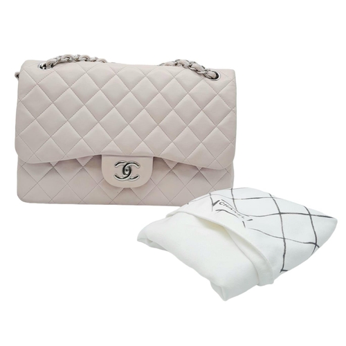 53 - Chanel Baby Pink Classic Flap Bag.
Quality quilted diamond stitch Chanel, with silver toned hardware... 