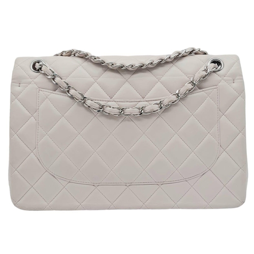 53 - Chanel Baby Pink Classic Flap Bag.
Quality quilted diamond stitch Chanel, with silver toned hardware... 